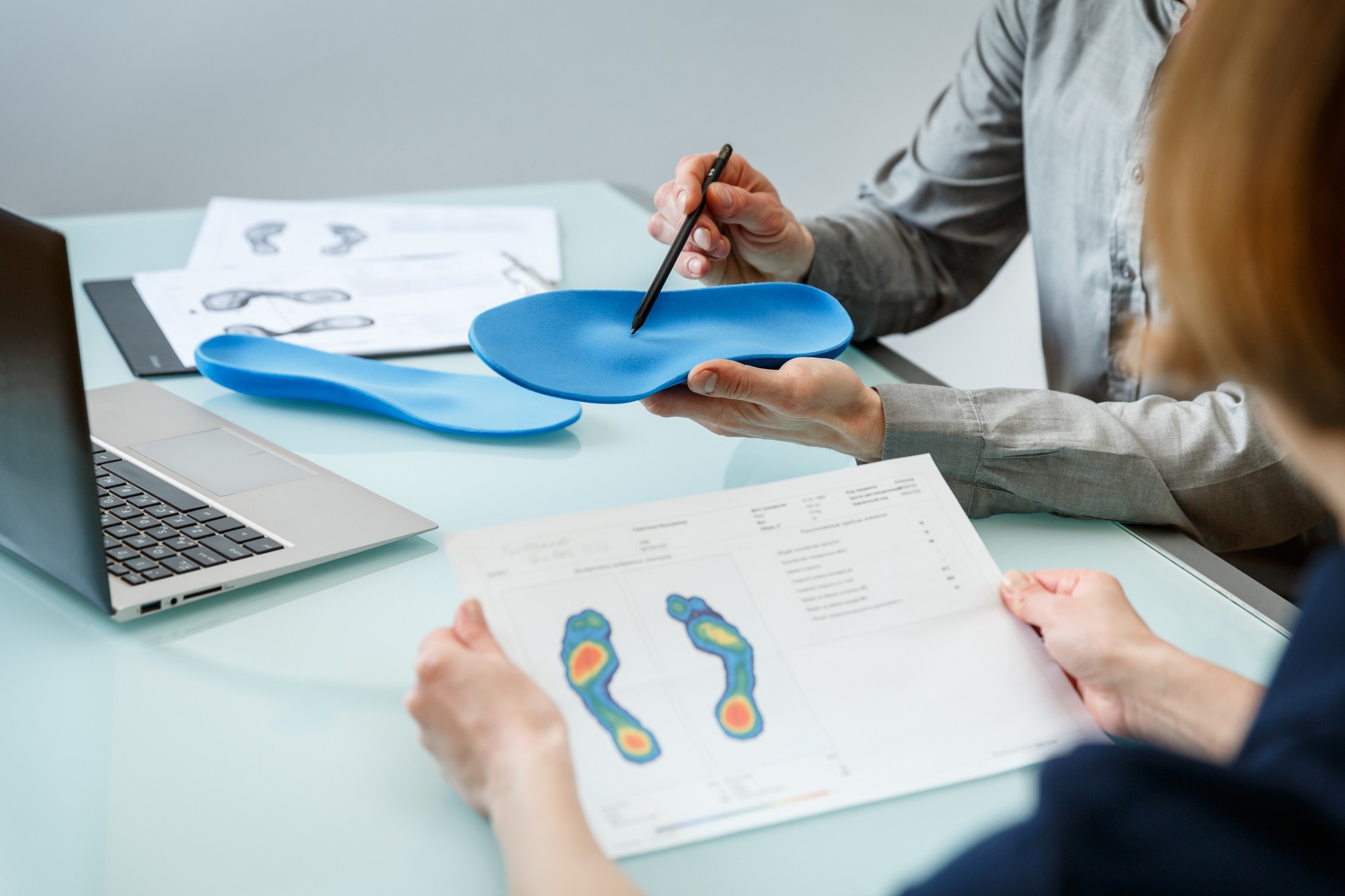 How Orthotic Footwear Improves Balance Toronto chiropodist performing gait analysis